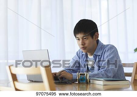 Japanese teenager studying programming View Large Photo Image Stock Photography - Japanese teenager studying programming. Fotosearch