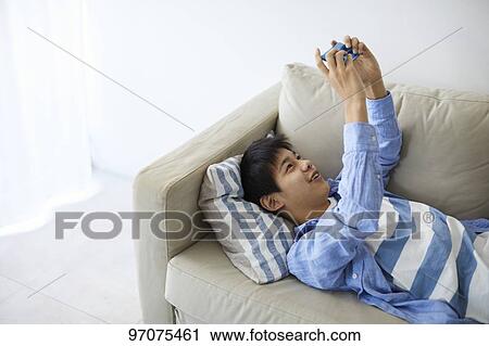 Japanese teenager with smartphone View Large Photo Image Stock Image - Japanese teenager with smartphone. Fotosearch