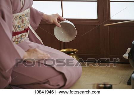 Stock Image - Japanese traditional tea ceremony. Fotosearch