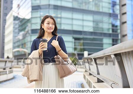 Japanese woman downtown Tokyo View Large Photo Image Stock Photograph - Japanese woman downtown Tokyo. Fotosearch