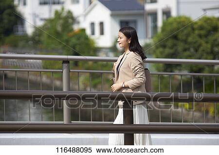 Japanese woman downtown Tokyo View Large Photo Image Stock Photography - Japanese woman downtown Tokyo. Fotosearch