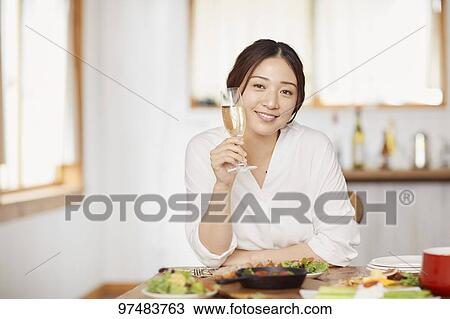Japanese woman having home party View Large Photo Image Stock Image - Japanese woman having home party. Fotosearch