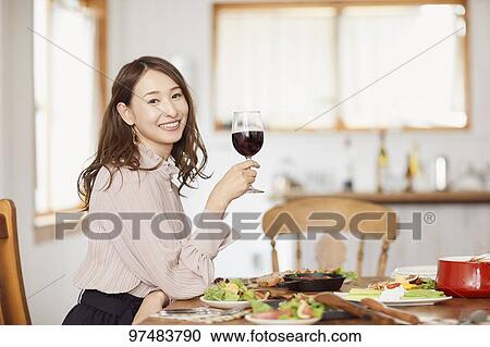 Japanese woman having home party View Large Photo Image Stock Image - Japanese woman having home party. Fotosearch