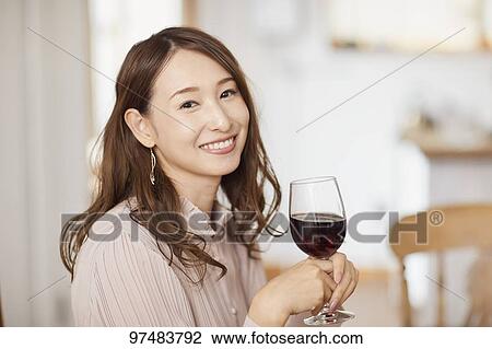 Japanese woman having home party View Large Photo Image Stock Image - Japanese woman having home party. Fotosearch