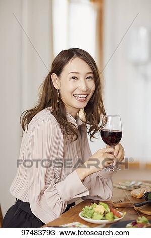 Japanese woman having home party View Large Photo Image Stock Image - Japanese woman having home party. Fotosearch