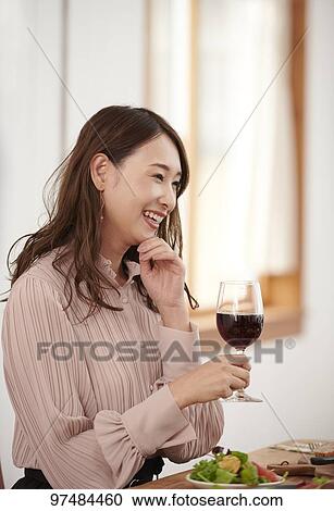 Japanese woman having home party View Large Photo Image Stock Image - Japanese woman having home party. Fotosearch