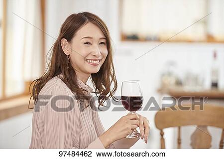 Japanese woman having home party View Large Photo Image Stock Image - Japanese woman having home party. Fotosearch