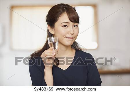 Japanese woman having home party View Large Photo Image Stock Photo - Japanese woman having home party. Fotosearch