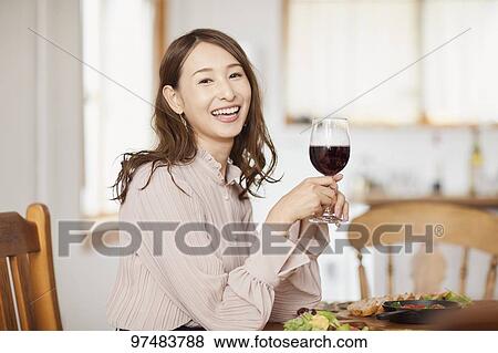 Japanese woman having home party View Large Photo Image Stock Photo - Japanese woman having home party. Fotosearch