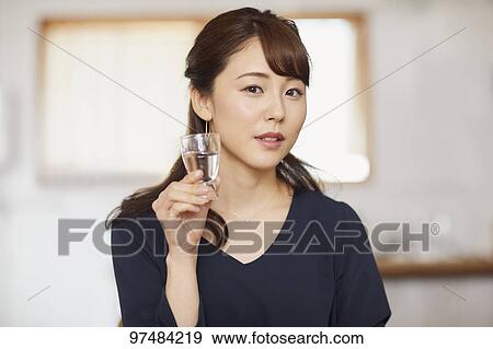 Japanese woman having home party View Large Photo Image Stock Photo - Japanese woman having home party. Fotosearch