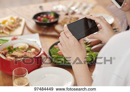 Japanese woman having home party View Large Photo Image Stock Photo - Japanese woman having home party. Fotosearch