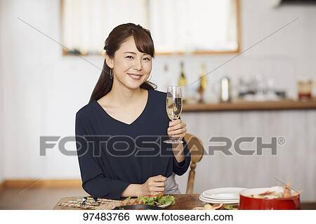 Japanese woman having home party View Large Photo Image Stock Photograph - Japanese woman having home party. Fotosearch