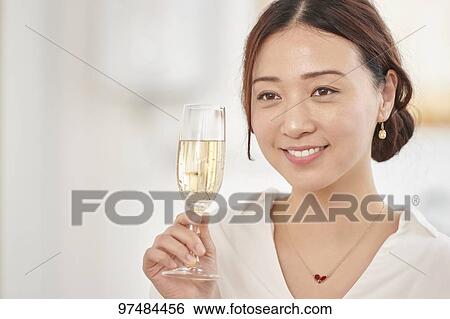 Japanese woman having home party View Large Photo Image Stock Photograph - Japanese woman having home party. Fotosearch
