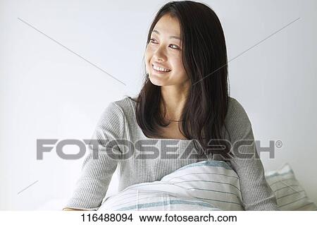 Japanese woman in bed View Large Photo Image Picture - Japanese woman in bed. Fotosearch