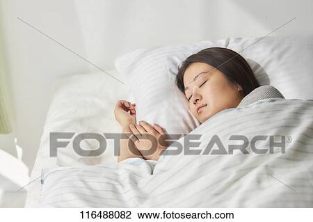 Japanese woman in bed View Large Photo Image Stock Image - Japanese woman in bed. Fotosearch