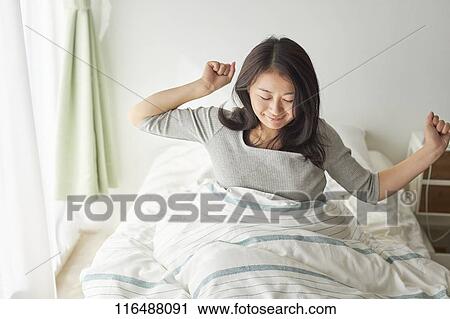 Japanese woman in bed View Large Photo Image Stock Image - Japanese woman in bed. Fotosearch