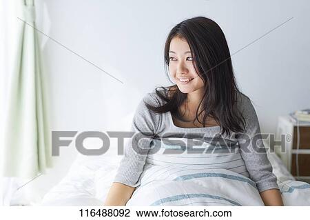 Japanese woman in bed View Large Photo Image Stock Image - Japanese woman in bed. Fotosearch
