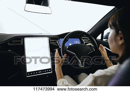 Japanese woman in self driving car View Large Photo Image Picture - Japanese woman in self driving car. Fotosearch