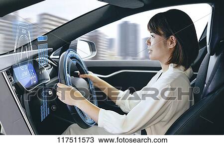 Japanese woman in self driving car View Large Photo Image Stock Image - Japanese woman in self driving car. Fotosearch