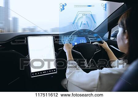 Japanese woman in self driving car View Large Photo Image Stock Image - Japanese woman in self driving car. Fotosearch
