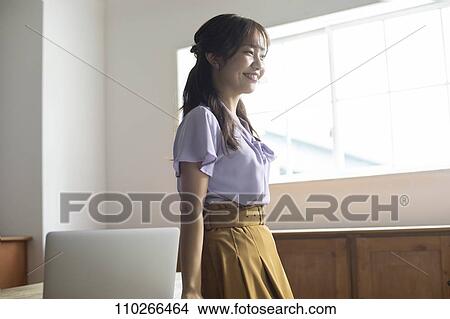 Japanese woman in the office View Large Photo Image Picture - Japanese woman in the office. Fotosearch