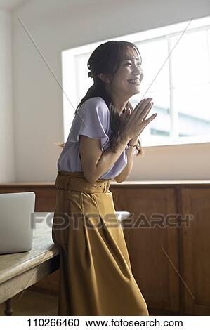 Japanese woman in the office View Large Photo Image Stock Image - Japanese woman in the office. Fotosearch