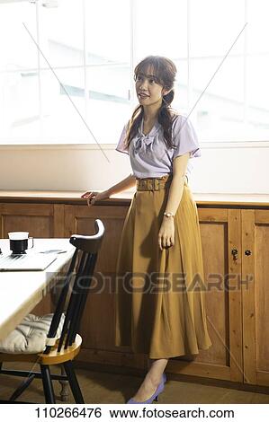 Japanese woman in the office View Large Photo Image Stock Photograph - Japanese woman in the office. Fotosearch
