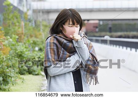 Japanese woman wearing mask View Large Photo Image Stock Photo - Japanese woman wearing mask. Fotosearch