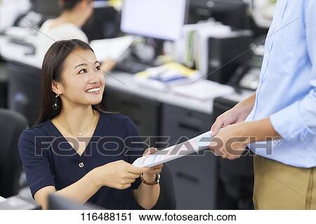 Japanese woman working in the office View Large Photo Image Stock Image - Japanese woman working in the office. Fotosearch