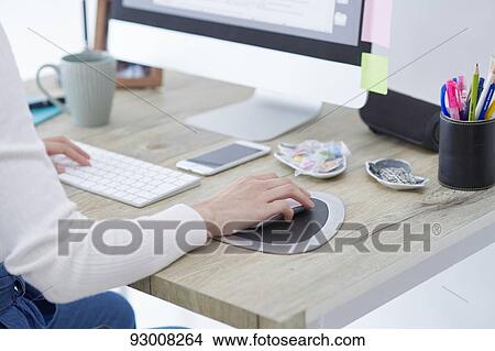 Japanese woman working remotely View Large Photo Image Picture - Japanese woman working remotely. Fotosearch
