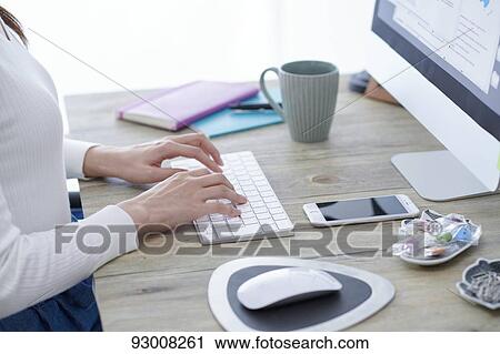Japanese woman working remotely View Large Photo Image Stock Image - Japanese woman working remotely. Fotosearch