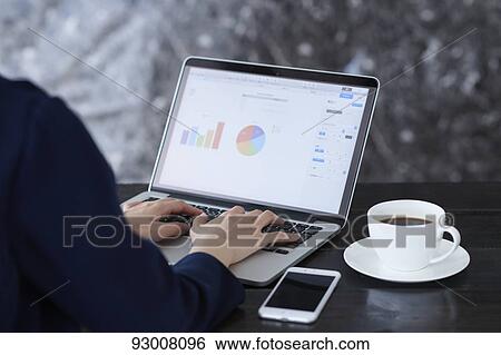 Japanese woman working remotely View Large Photo Image Stock Photograph - Japanese woman working remotely. Fotosearch