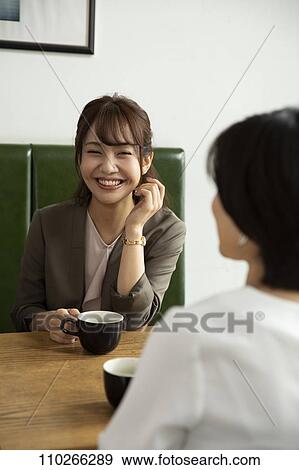 Japanese women at a cafe View Large Photo Image Stock Photo - Japanese women at a cafe. Fotosearch
