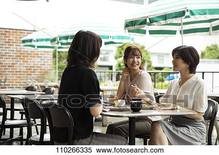 Japanese women at a cafe View Large Photo Image Stock Photography - Japanese women at a cafe. Fotosearch