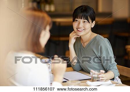 Japanese women at a restaurant View Large Photo Image Stock Photo - Japanese women at a restaurant. Fotosearch