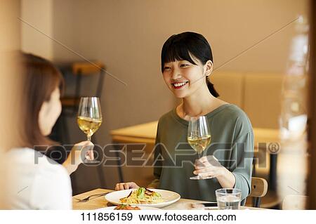 Japanese women at a restaurant View Large Photo Image Stock Photo - Japanese women at a restaurant. Fotosearch