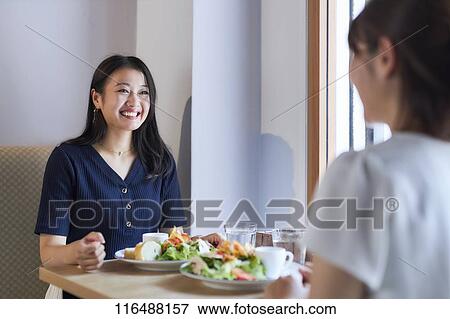 Stock Photo - Japanese women at a restaurant. Fotosearch