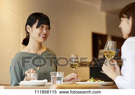 Japanese women at a restaurant View Large Photo Image Stock Photography - Japanese women at a restaurant. Fotosearch