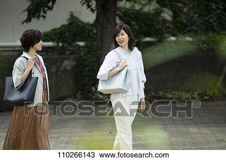 Japanese women downtown View Large Photo Image Stock Image - Japanese women downtown. Fotosearch