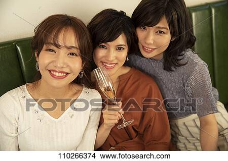 Japanese women happily dining together View Large Photo Image Picture - Japanese women happily dining together. Fotosearch