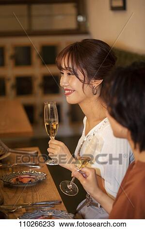 Japanese women happily dining together View Large Photo Image Stock Image - Japanese women happily dining together. Fotosearch