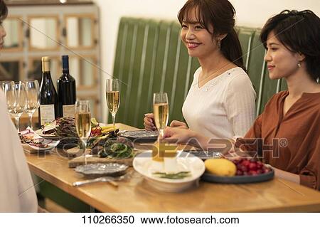 Japanese women happily dining together View Large Photo Image Stock Image - Japanese women happily dining together. Fotosearch