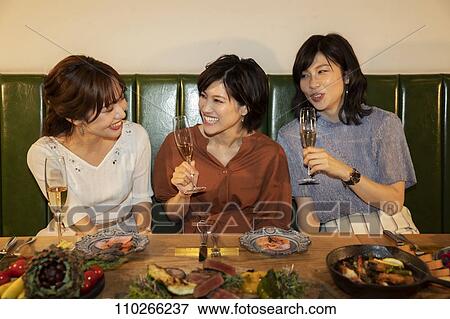 Japanese women happily dining together View Large Photo Image Stock Photo - Japanese women happily dining together. Fotosearch