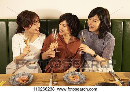 Japanese women happily dining together View Large Photo Image Stock Photo - Japanese women happily dining together. Fotosearch