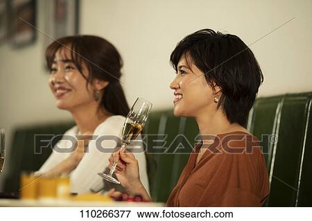 Japanese women happily dining together View Large Photo Image Stock Photo - Japanese women happily dining together. Fotosearch