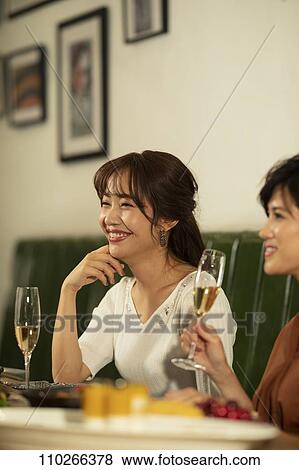 Japanese women happily dining together View Large Photo Image Stock Photo - Japanese women happily dining together. Fotosearch