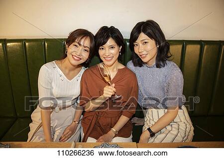 Japanese women happily dining together View Large Photo Image Stock Photograph - Japanese women happily dining together. Fotosearch