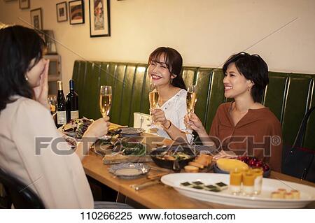 Japanese women happily dining together View Large Photo Image Stock Photography - Japanese women happily dining together. Fotosearch