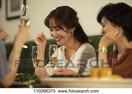 Japanese women happily dining together View Large Photo Image Stock Photography - Japanese women happily dining together. Fotosearch