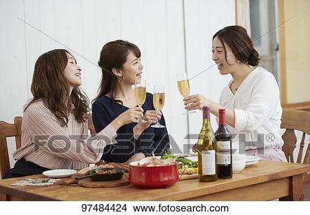 Japanese women having home party View Large Photo Image Picture - Japanese women having home party. Fotosearch